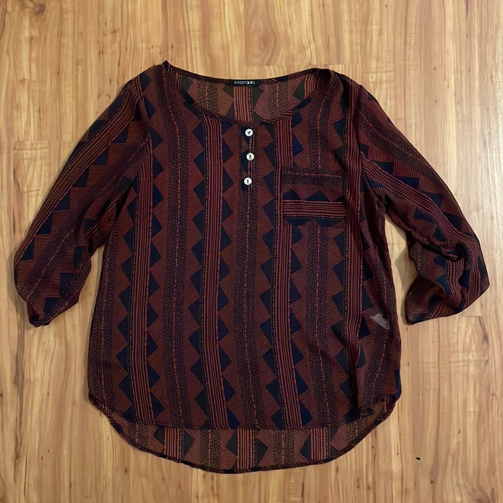 Shear blouse with button detail